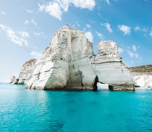 Blue ocean with white cliffs.