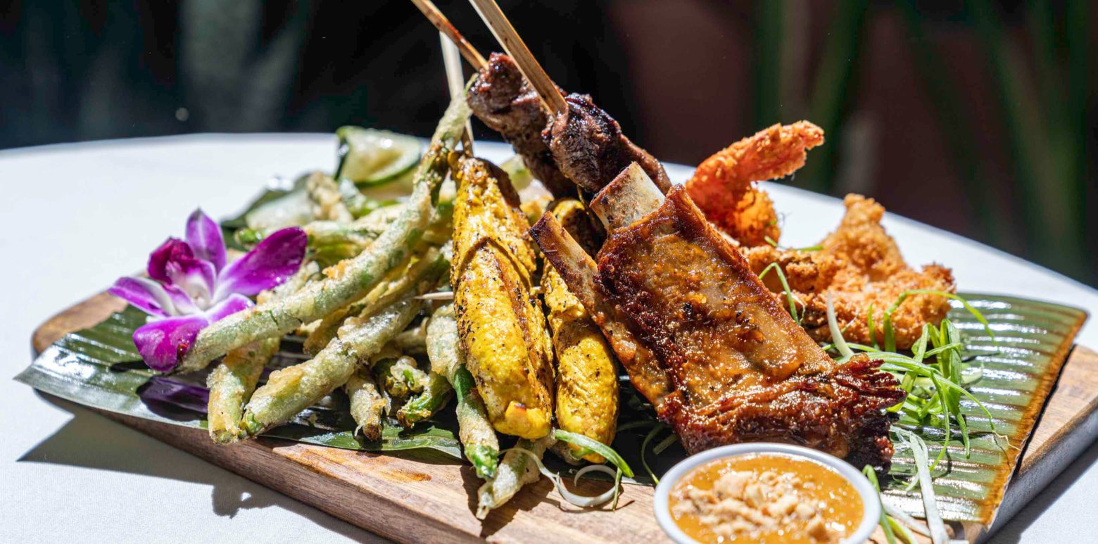 A dish of meat and veggies.