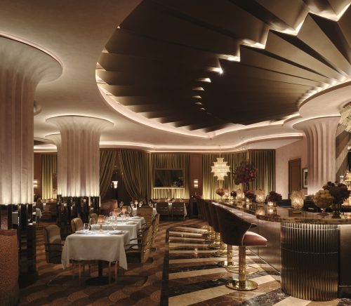 The Ra Ra Room dining room with art deco decor and a large bar.